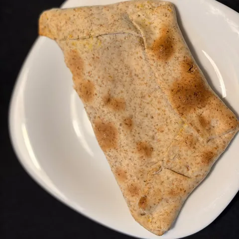 Empanada pastelera de choclo vegana, de masa integral